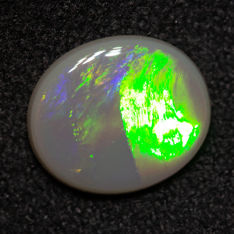 1.03 ct dark opal 9.2x7.8x2.1mm