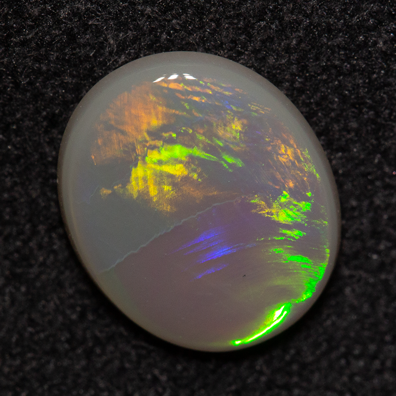 1.03 ct dark opal 9.2x7.8x2.1mm