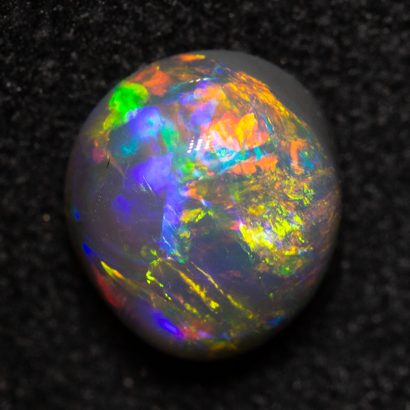 1.05 ct dark opal gem 6.5x6x4mm