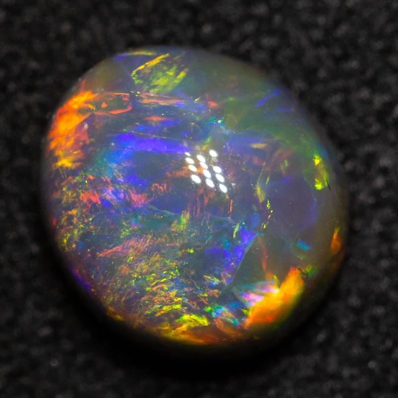 1.05 ct dark opal gem 6.5x6x4mm