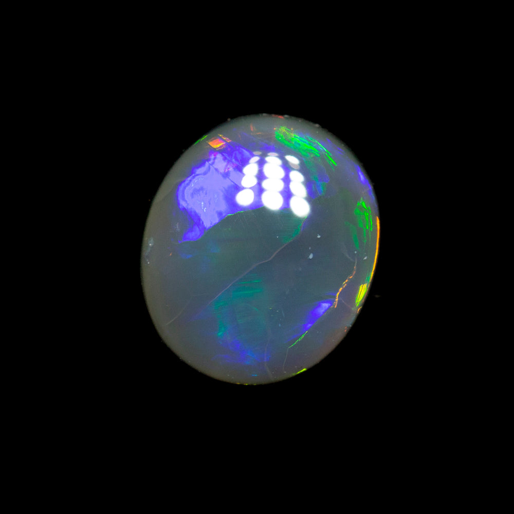 1.05 ct black opal 7.9x6.4x3.1mm