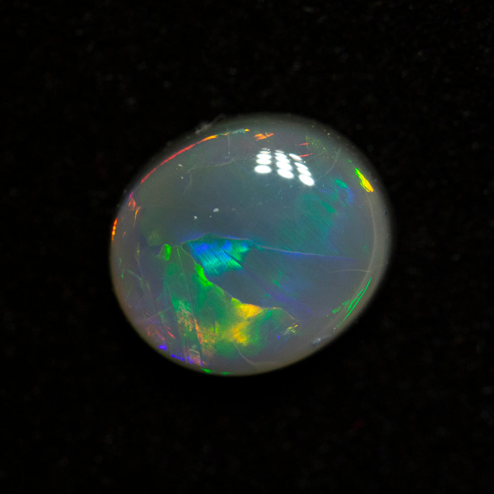 1.05 ct black opal 7.9x6.4x3.1mm