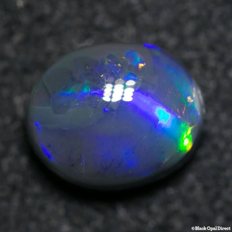 1.05 ct black opal 7x6x3.5mm