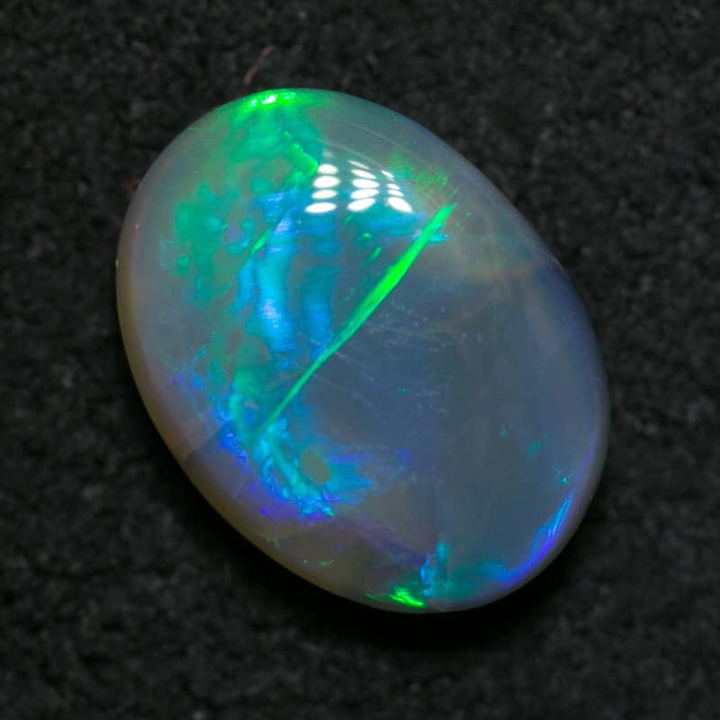 1.06 dark crystal opal 8x7x2mm
