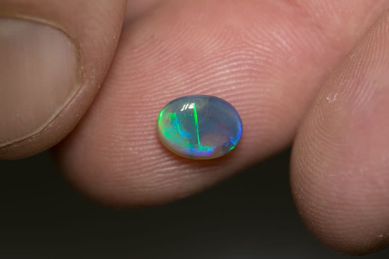 1.06 dark crystal opal 8x7x2mm