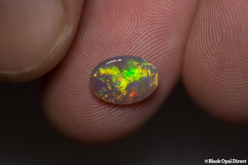 1.08 ct green orange crystal opal 10x7x2mm