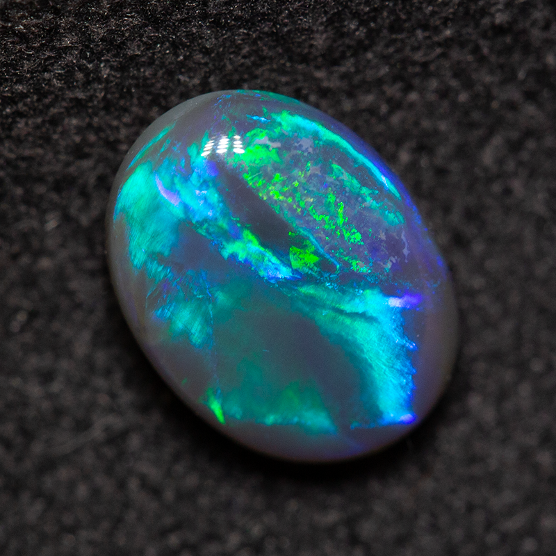 1.09 ct black opal 8.1x6.1x3.3mm