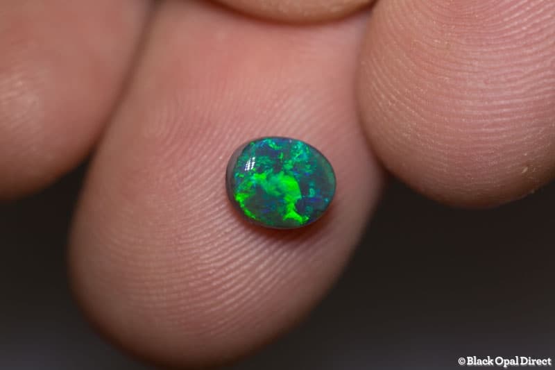 1.09 ct black opal 7x6x3.5mm