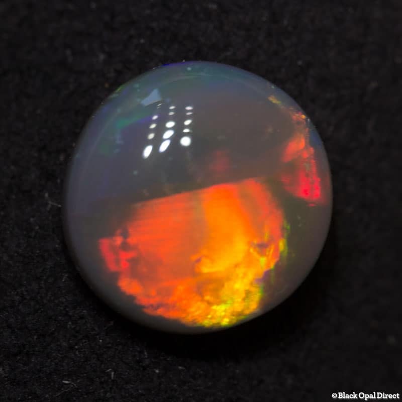 1.09 ct semi black opal 7.7mm round x3mm