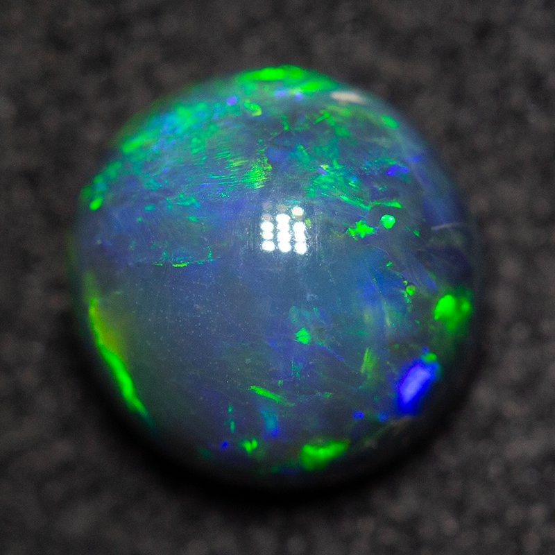 1.10 ct black opal gem 6.5x6.5x4mm