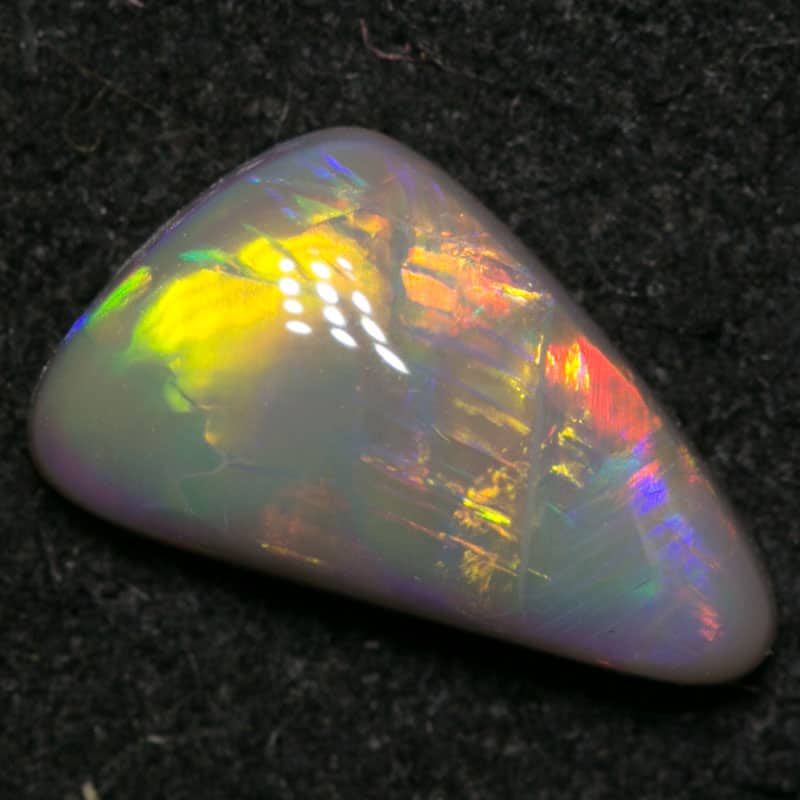 1.10 ct dark opal 10x6x3mm