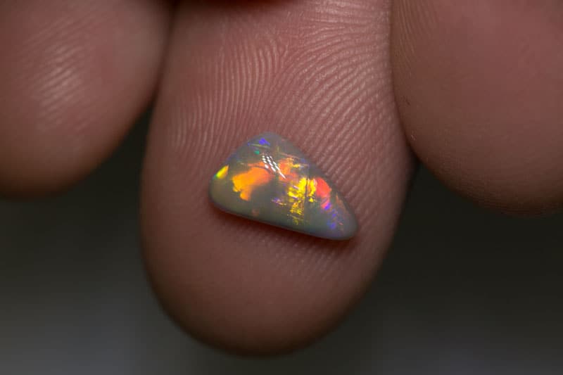 1.10 ct dark opal 10x6x3mm