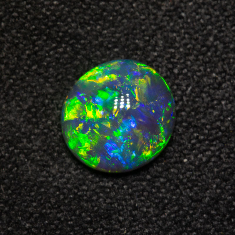 1.11 ct black crystal opal 7.6x7.1x3.3mm
