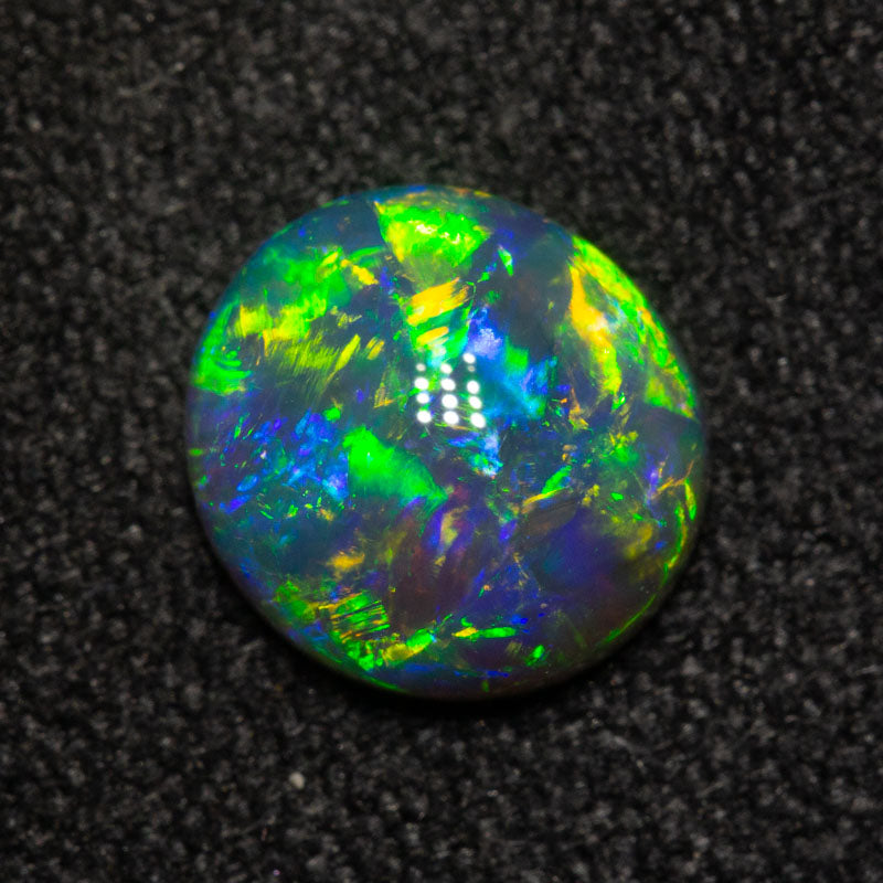 1.11 ct black crystal opal 7.6x7.1x3.3mm