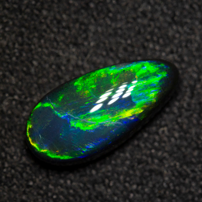 1.12 ct black opal 10.4x5x3.6mm