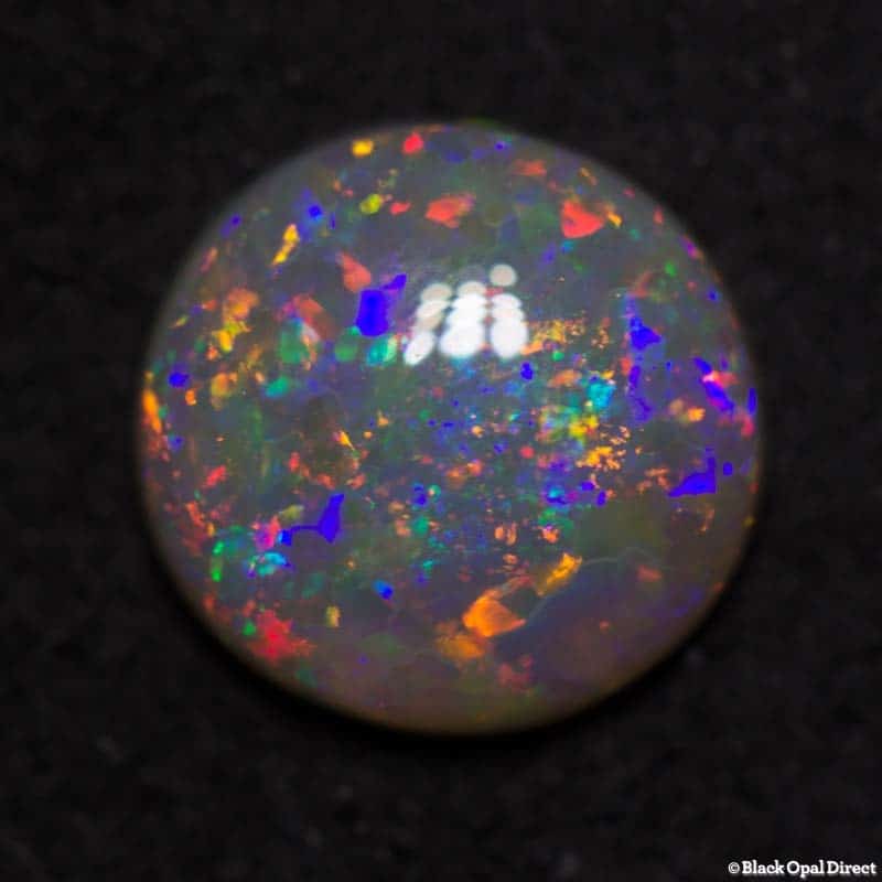 1.12 ct semi black opal 8x7.5x2.5mm