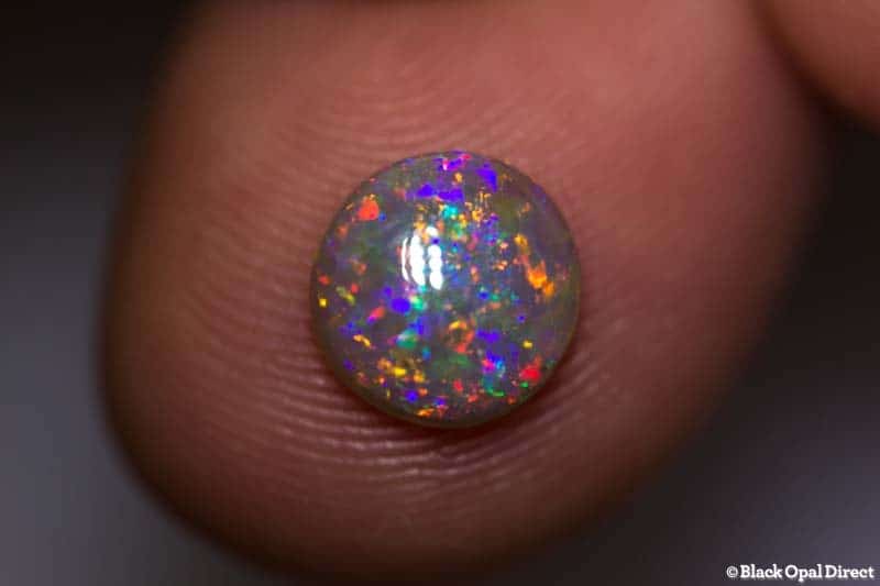 1.12 ct semi black opal 8x7.5x2.5mm