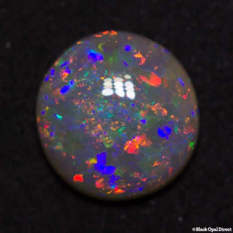 1.12 ct semi black opal 8x7.5x2.5mm