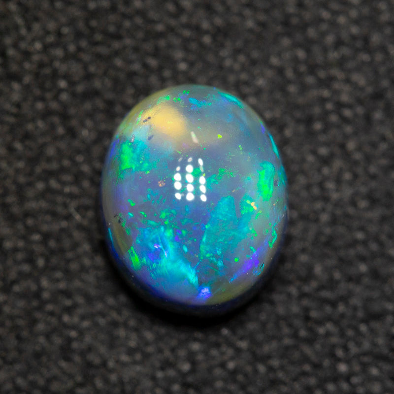 1.13 ct black opal 7x5.8x4.7mm