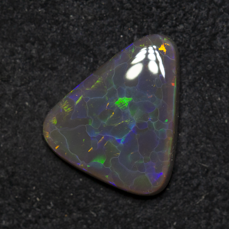 1.13 ct black opal 9.4x8.2x2.5mm