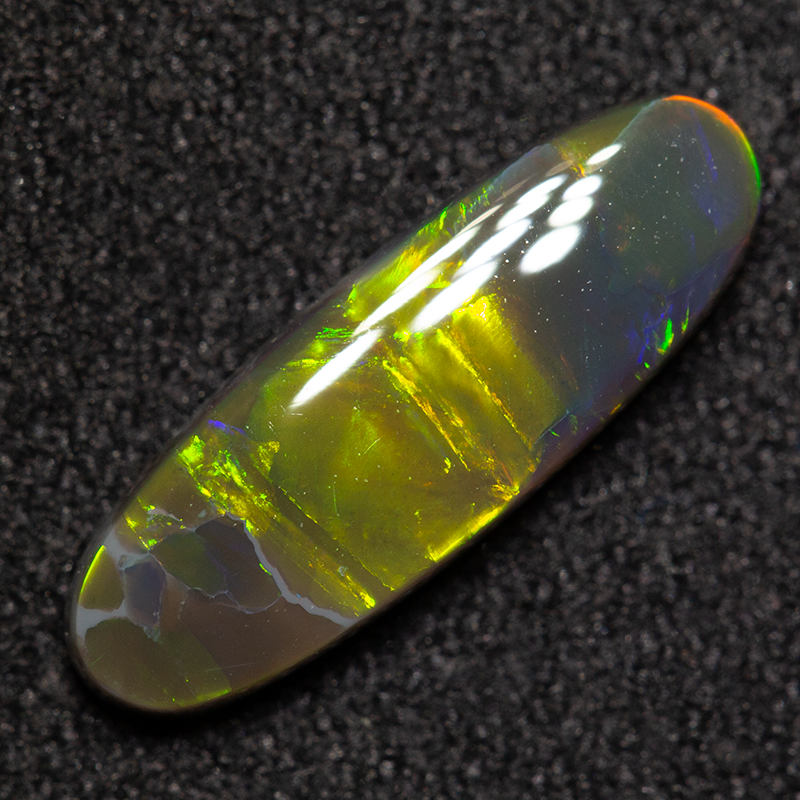 1.13 ct black opal 14x4.7x2.4mm