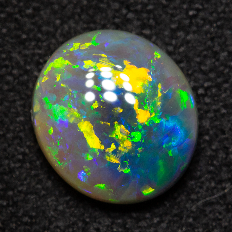 1.15 ct dark opal 7.9x7.1x3.1mm