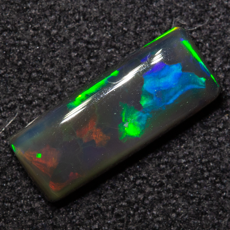 1.15 ct black opal 10.4x4.3x3mm