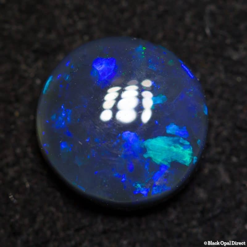 1.16 ct black opal 7mm round x3mm thick