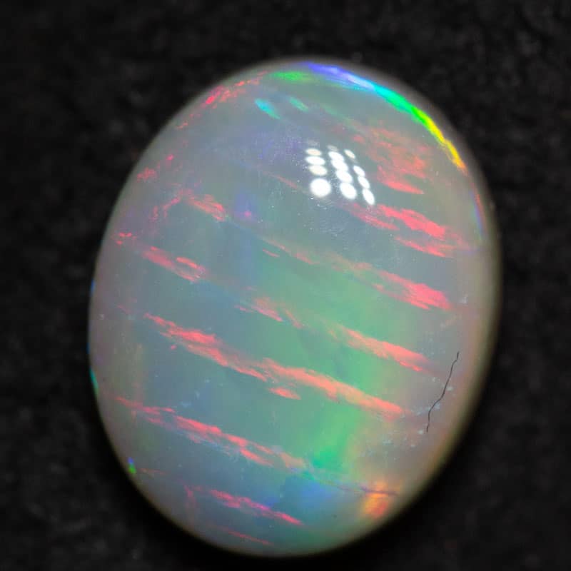 1.17 ct dark fish scale pattern opal 8.3x6.8x3.2mm