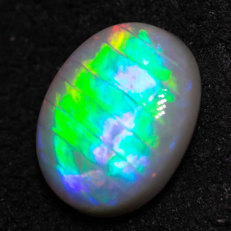 1.17 ct dark fish scale pattern opal 8.3x6.8x3.2mm