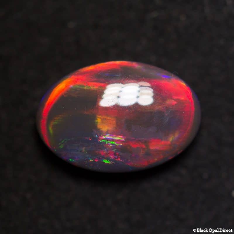 1.19 ct red on black opal gem 9x6x3mm