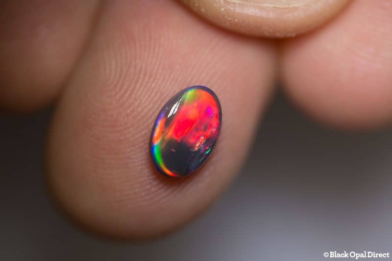 1.19 ct red on black opal gem 9x6x3mm