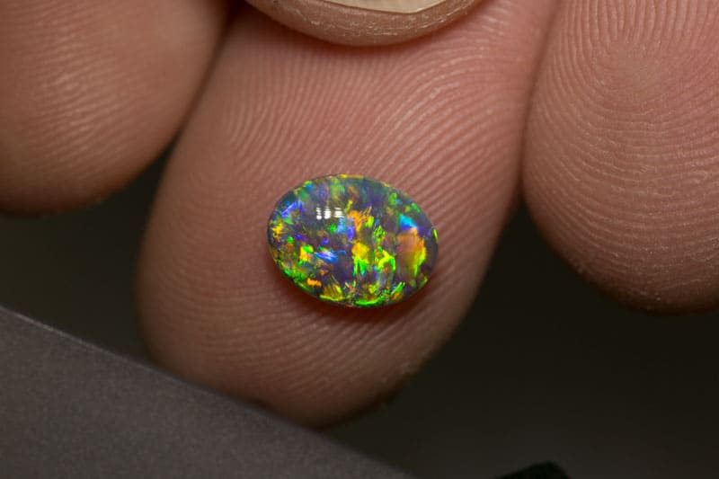 1.22 ct double sided black crystal opal 9x7x3.5mm
