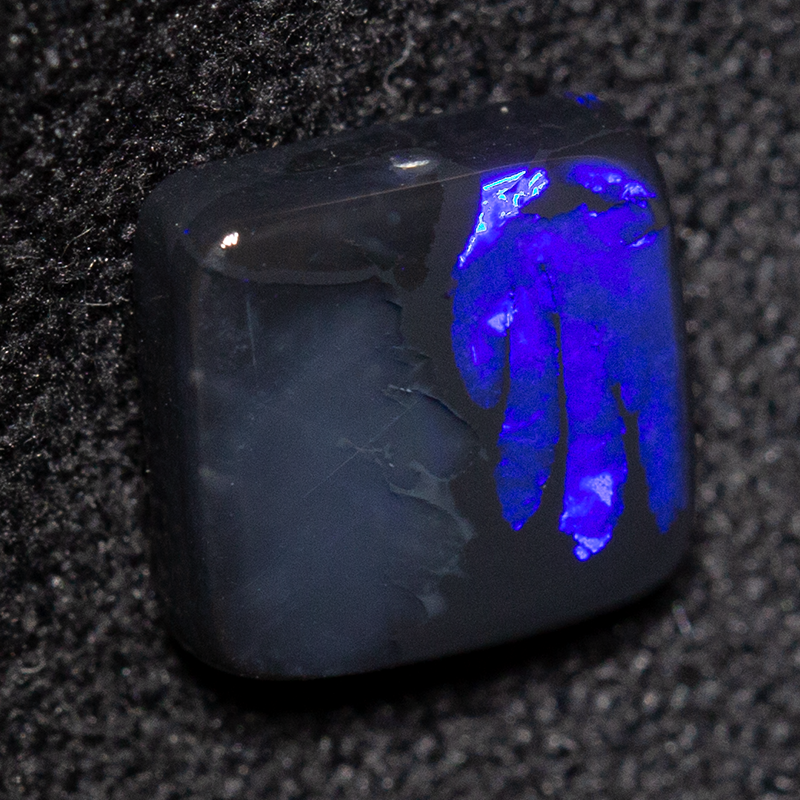 1.25 ct black opal 7.2x6.8x2.7mm