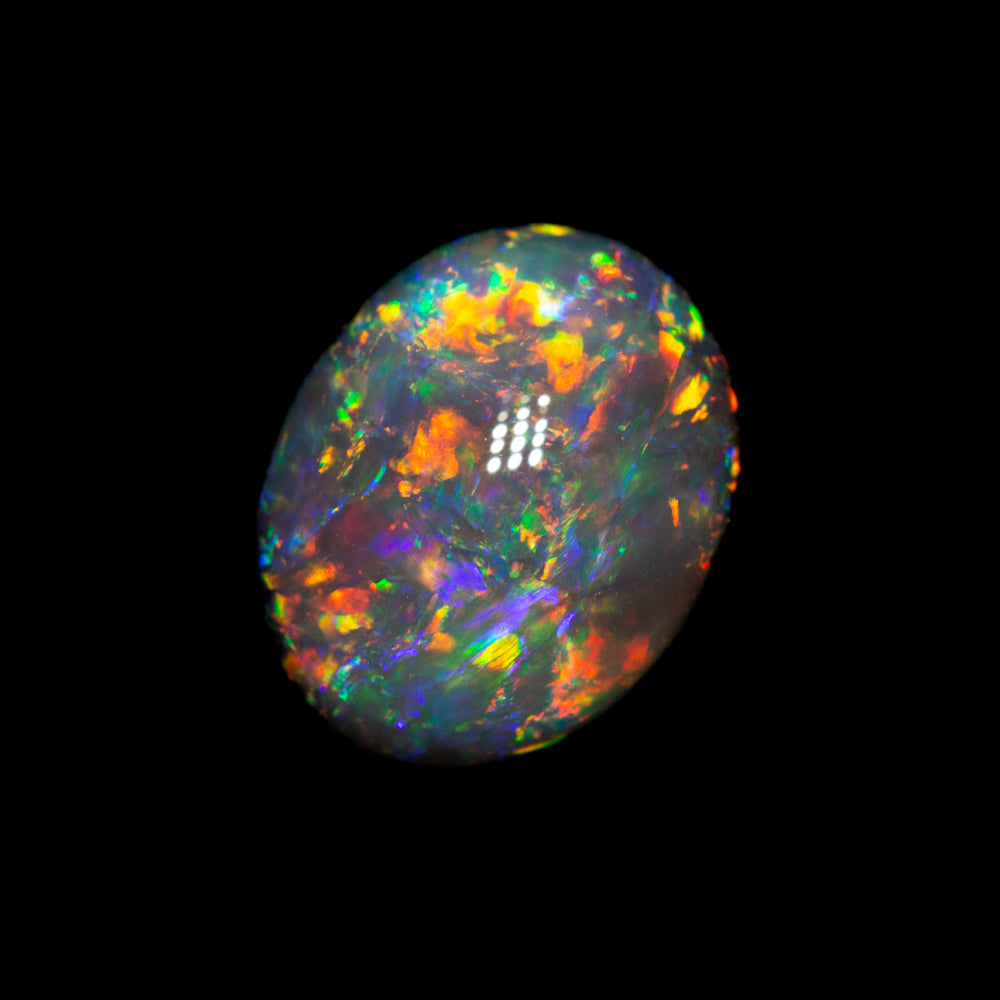 1.26 ct black opal 8.1x6.5x4.1mm