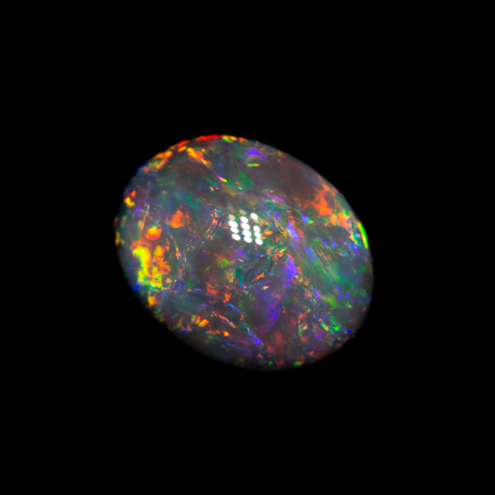 1.26 ct black opal 8.1x6.5x4.1mm