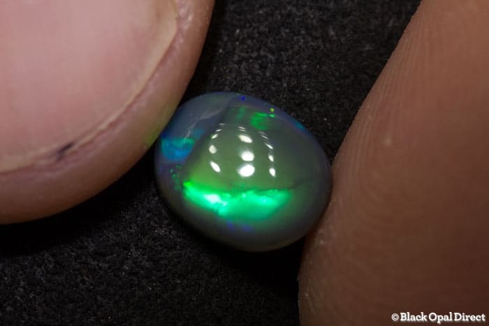1.26 ct black opal 8x7x3mm