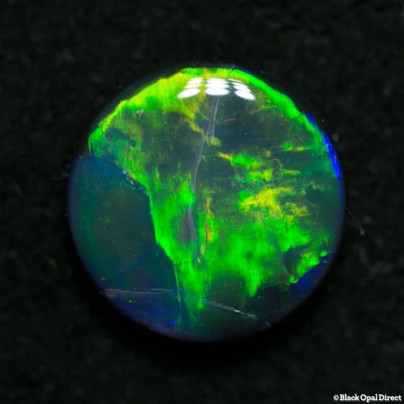 1.27 ct black opal 8mm round x 3mm