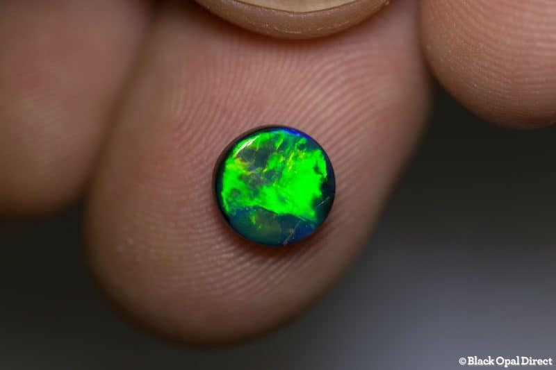 1.27 ct black opal 8mm round x 3mm