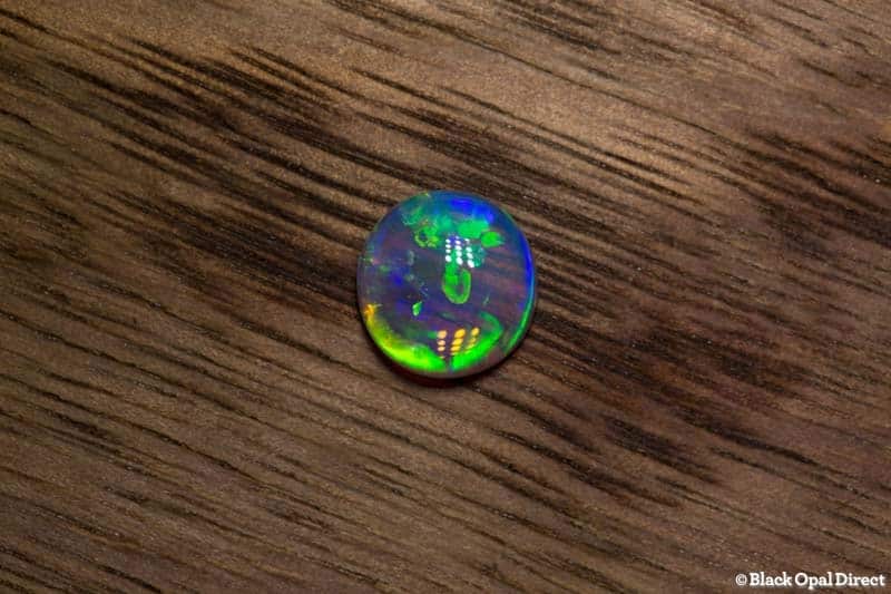 1.27 ct gem crystal opal double sided 8x7.5x3mm
