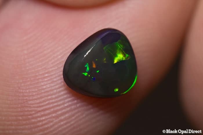 1.28 ct baroque black opal 8x7x3mm
