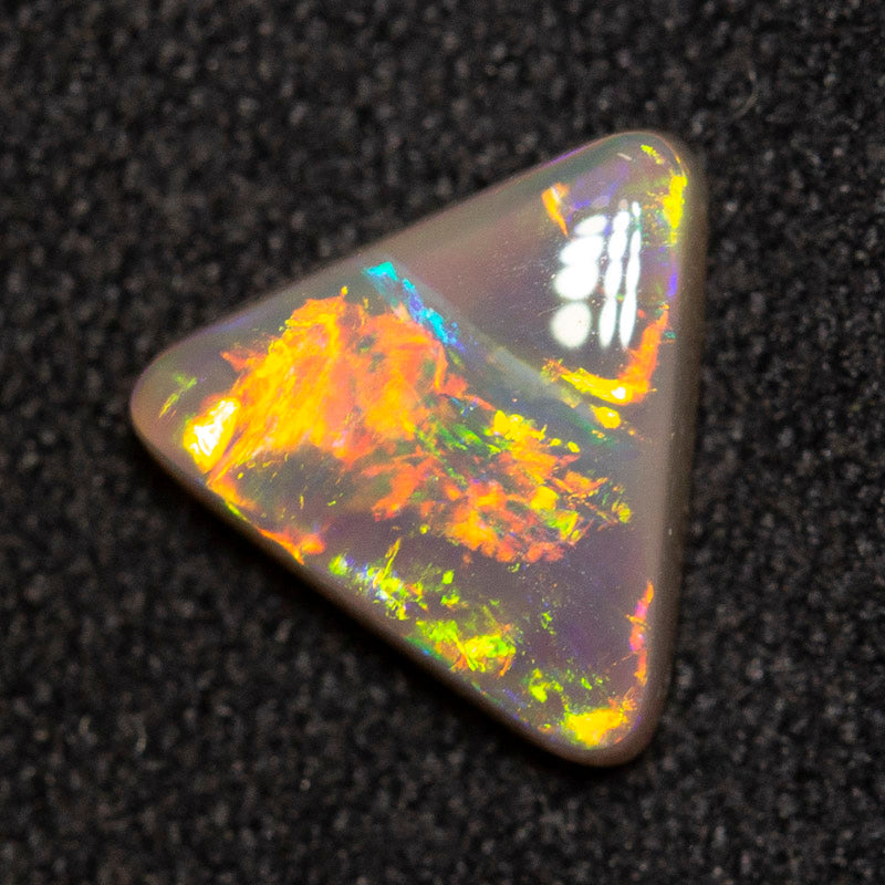 1.29 ct dark opal 8.8x8.1x3.1mm