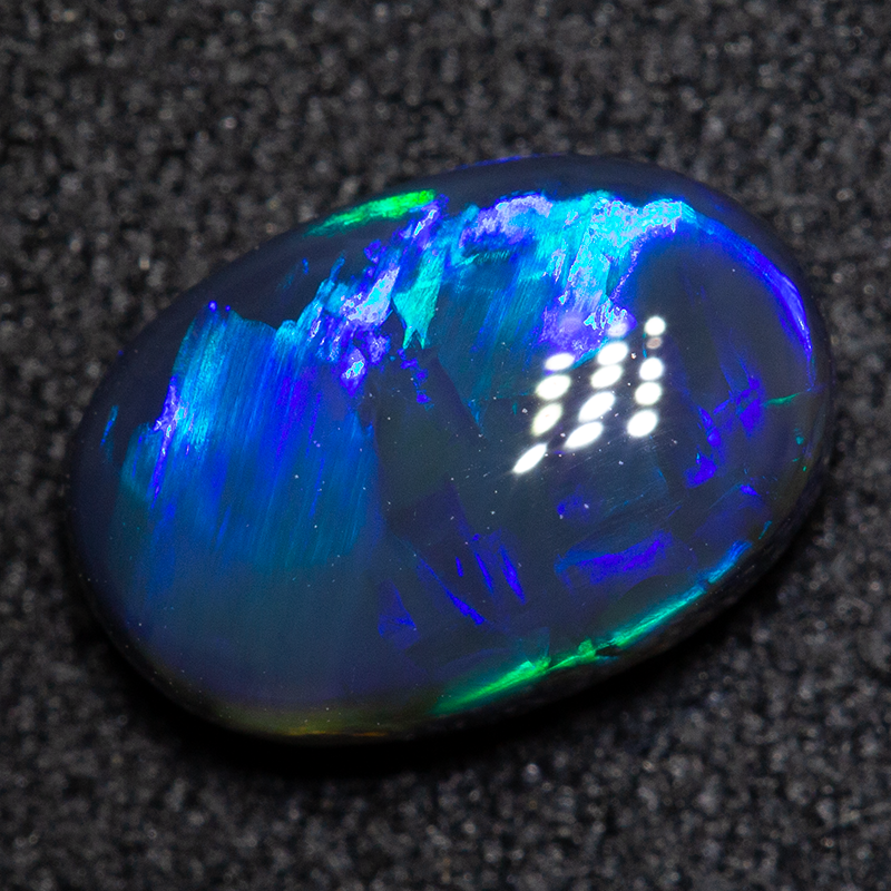 1.33 ct black opal 9x6x3mm