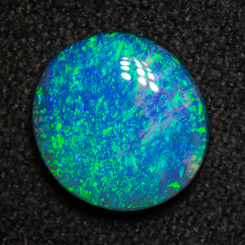 1.33 ct black opal 8.5x7.7x3mm