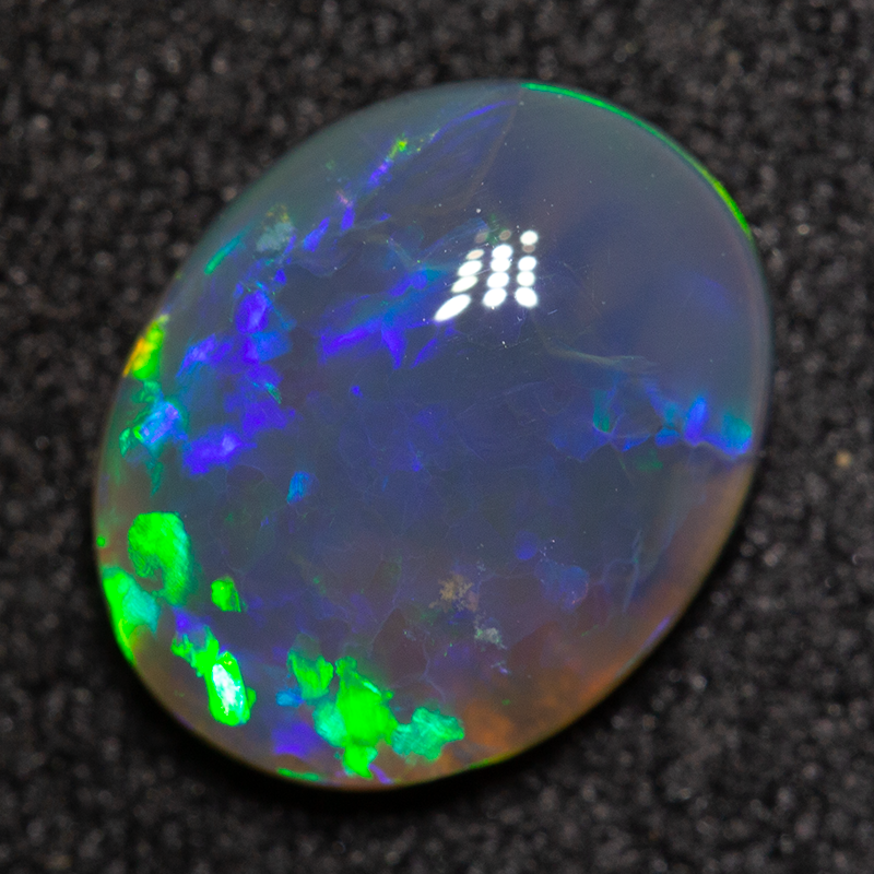 1.34 ct black opal 9.5x7.6x3.1mm