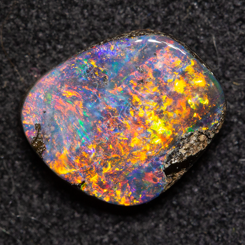 1.34 ct boulder opal 7.6x6.9x2.9mm