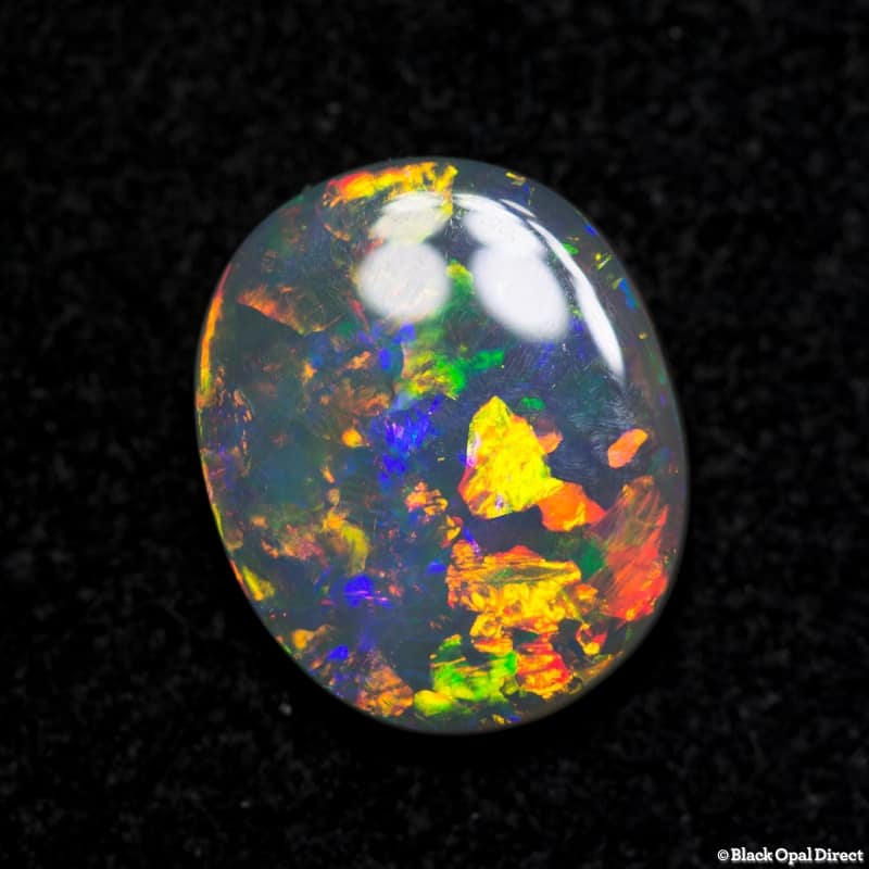 1.38 ct orange green crystal opal 10x8x2mm