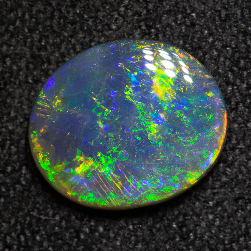 1.37 ct black opal 9.4x7.4x2.7mm