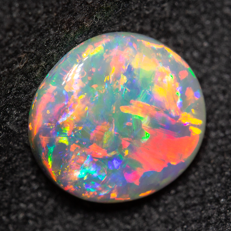 1.38 ct dark opal 8.4x7.9x3.4mm