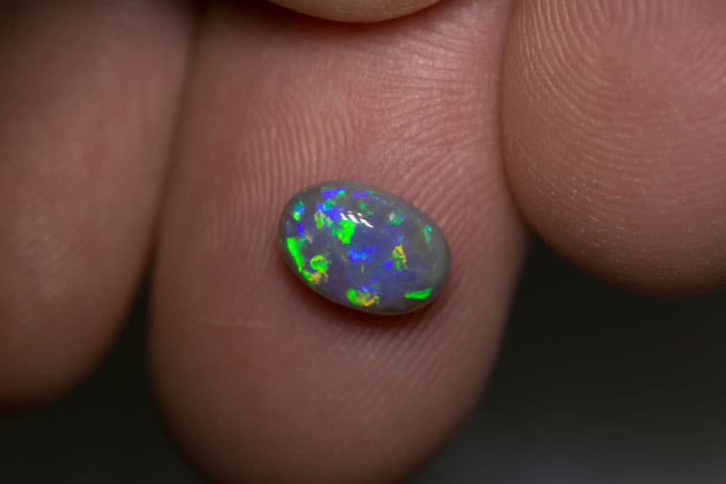 1.38 ct dark opal 9x6x4mm